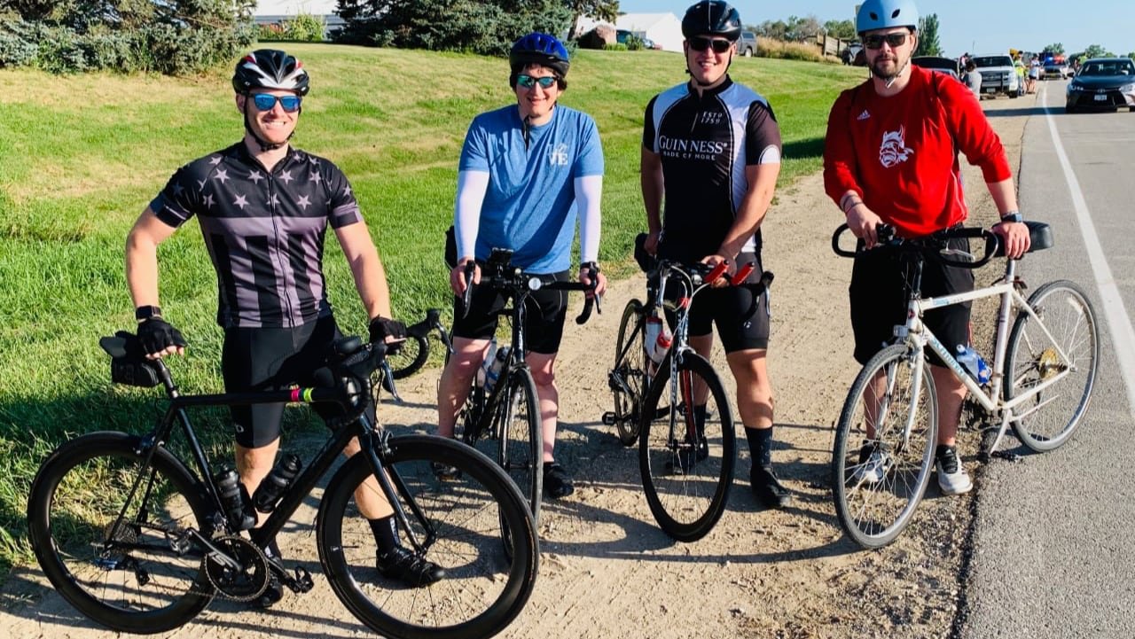 Chris, Jeremy, myself, and Cole standing just before we ride
