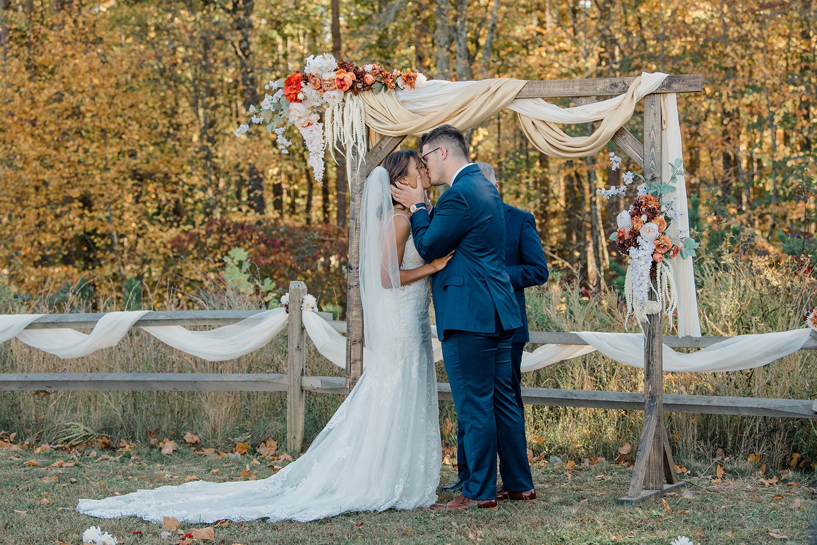 Kalika and I kissing as we become married